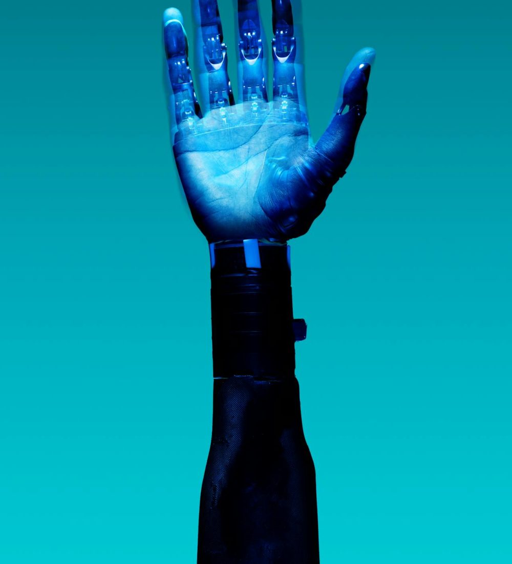 prosthetic arm on blue background